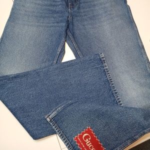 Gucci Men Straight, wide leg NWT for men, size 33, Gucci patch on leg